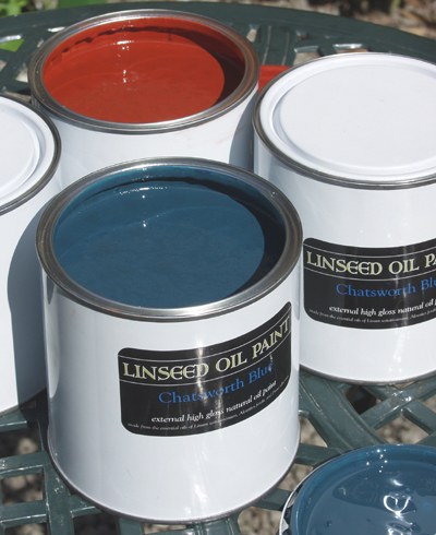 photograph of tins of linseed oil paint